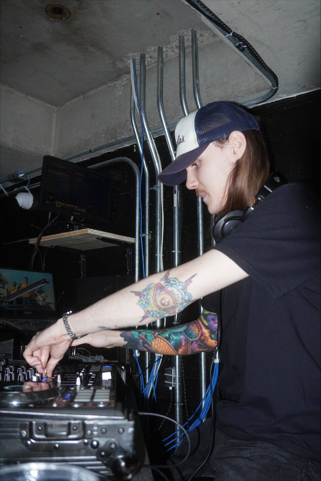 DJ playing music inside Fieldhouse